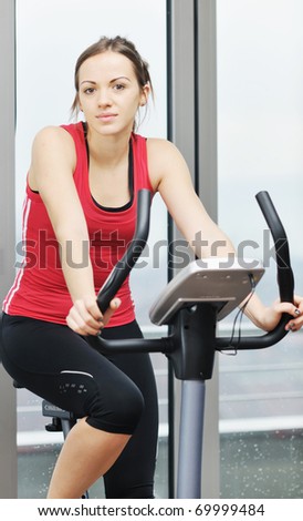 stock photo young woman exercise fitness and workout while run on track in sport club 69999484 Getting a Email Order Star of the event