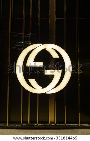 HONG KONG - OCTOBER 25, 2015: Gucci logo. Gucci is an Italian fashion and leather goods brand, part of the Gucci Group, which is owned by the French holding company Kering