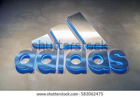 HONG KONG - CIRCA NOVEMBER, 2016: Adidas sign at a store in Hong Kong. Adidas AG is a German multinational corporation that designs and manufactures shoes, clothing and accessories.