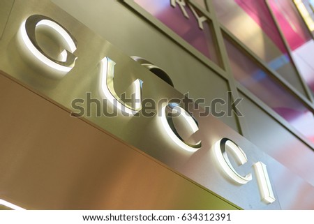 SINGAPORE - CIRCA SEPTEMBER, 2016: close up shot of Gucci sign at Singapore Changi Airport. Changi Airport is one of the largest transportation hubs in Southeast Asia.