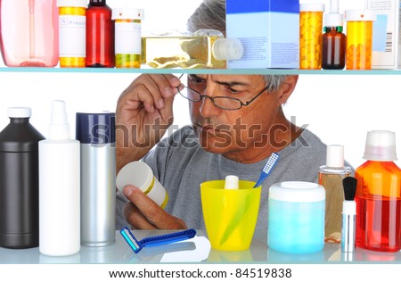 Unshaven Middle Aged Man Reading Prescription Stock Photo 84519838