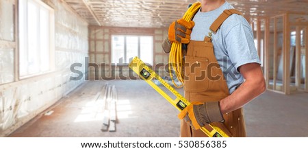 Electrician with electrical cable