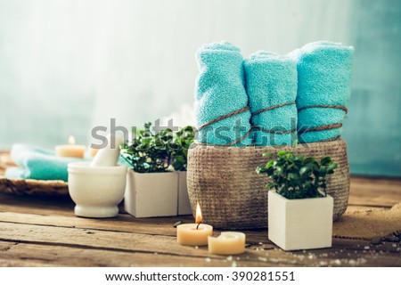Spa and wellness setting with flowers and towels. Dayspa nature products