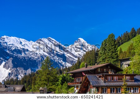 Swiss Mountain House beautiful swiss mountain valley landscape house stock photo Swiss Mountain House beautiful swiss mountain valley landscape house stock photo