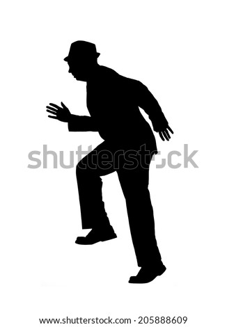 Silhouette of a man in a suit and hat running or climbing stairs ...