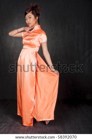 A Vietnamese woman in her colorful Ao Dai