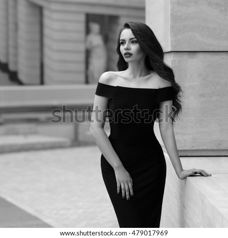 https://thumb7.shutterstock.com/display_pic_with_logo/571009/479017969/stock-photo-black-and-white-portrait-of-young-beautiful-elegant-woman-in-black-dress-pretty-sensual-girl-with-479017969.jpg