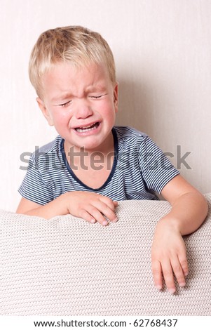 Small child is cry, indoor.
