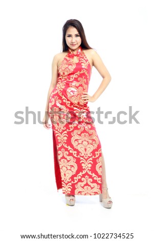 https://thumb7.shutterstock.com/display_pic_with_logo/571357/1022734525/stock-photo-beautiful-asian-woman-in-traditional-red-chinese-dress-side-split-qipao-cheongsam-or-mandarin-1022734525.jpg