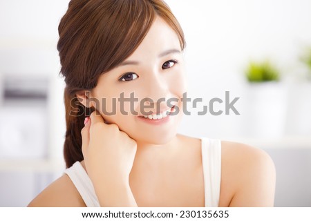 smiling young asian woman face