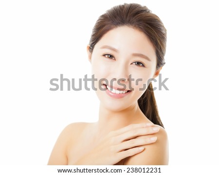 smiling beautiful young woman face isolated on white