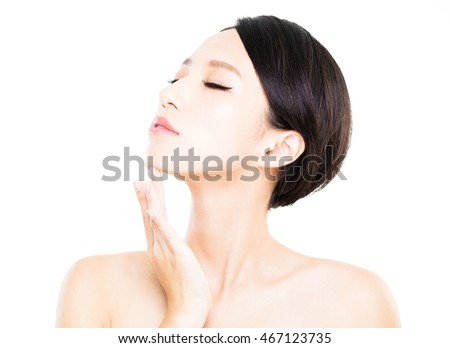 Beautiful face of young woman with clean fresh skin