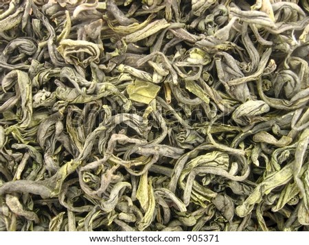 Vietnamese green loose leaf tea "Thai Nguyen" Macro background