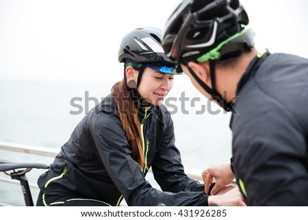 https://thumb7.shutterstock.com/display_pic_with_logo/580987/431926285/stock-photo-woman-and-man-cyclists-flirting-outdoors-431926285.jpg