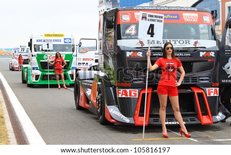 ISTANBUL - MAY 13: Markus Oestreich (4) and Jochen Hahn (1) at start grid before fourth race of 2012 FIA European Truck Racing Championship, Istanbul Park on May 13, 2012 in Istanbul, Turkey.