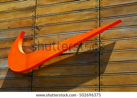 TAGUIG, PH - OCT. 1: Nike logo sign on October 1, 2016 in Bonifacio Global City, Taguig, Philippines. Nike Inc. is an American multinational corporation that is engaged in sales of footwear & apparel.