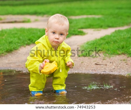 Child playing in rain Stock Photos, Images, & Pictures | Shutterstock