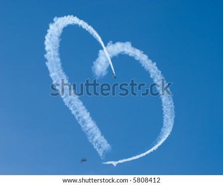 https://thumb7.shutterstock.com/display_pic_with_logo/6058/6058,1191363093,1/stock-photo-a-heart-in-the-sky-from-skywriting-biplanes-5808412.jpg