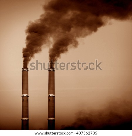 Two smoke stacks, sepia