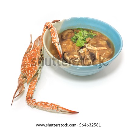 Braised fish maw in red gravy abalone mushroom with crab meat, The presentation of the more interesting and difference on with teamed crabs trying to use the pincers fork over of food in the bowl.