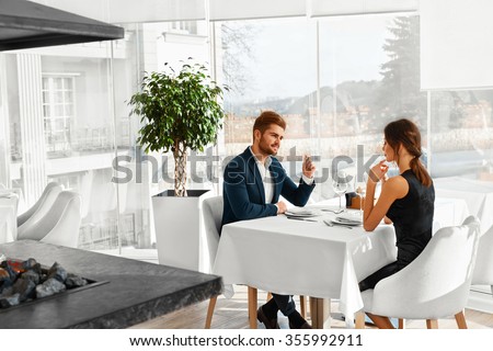 http://thumb7.shutterstock.com/display_pic_with_logo/614404/355992911/stock-photo-romantic-dinner-happy-lovely-couple-celebrating-anniversary-or-valentine-s-day-together-in-luxury-355992911.jpg