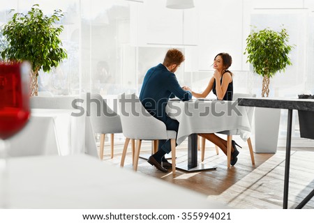 https://thumb7.shutterstock.com/display_pic_with_logo/614404/355994021/stock-photo-romantic-dinner-happy-lovely-couple-celebrating-anniversary-or-valentine-s-day-together-in-luxury-355994021.jpg