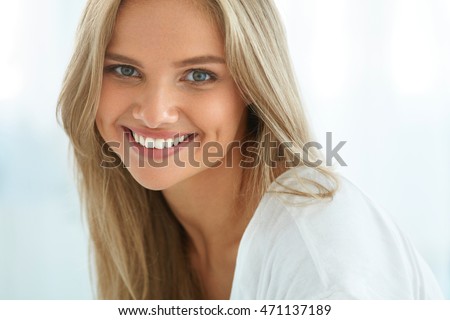 https://thumb7.shutterstock.com/display_pic_with_logo/614404/471137189/stock-photo-beautiful-woman-smiling-portrait-of-attractive-happy-healthy-girl-with-perfect-smile-white-teeth-471137189.jpg