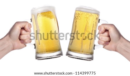 stock-photo-two-hands-holding-beers-maki