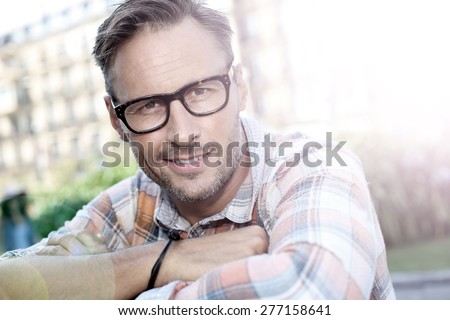 Stylish handsome man in urban scene