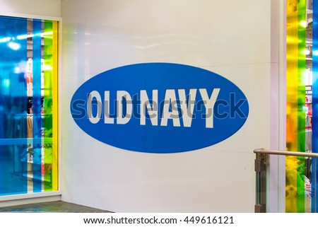 TORONTO,CANADA-JUNE 24,2016: Old Navy blue logo printed on wall. Old Navy is an American clothing and accessories retailer owned by American multinational corporation, Gap.