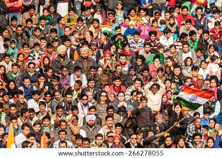 stock-photo-wagah-india-january-crowd-of-indian-people-celebrating-at-india-pakistan-wagah-border-266278055.jpg
