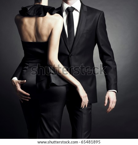 https://thumb7.shutterstock.com/display_pic_with_logo/63356/63356,1290227066,1/stock-photo-conceptual-portrait-of-a-young-couple-in-elegant-evening-dresses-65481895.jpg
