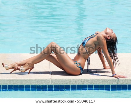 https://thumb7.shutterstock.com/display_pic_with_logo/63555/63555,1276108556,1/stock-photo-beautiful-woman-sunbathing-beside-swimming-pool-55048117.jpg