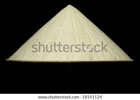 Vietnamese conical leaf hat on black background