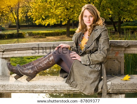 https://thumb7.shutterstock.com/display_pic_with_logo/639016/639016,1320096786,1/stock-photo-full-figure-portrait-of-beautiful-young-woman-in-the-park-at-fall-87809377.jpg