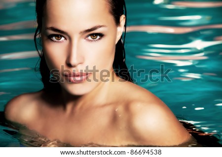 young woman beauty portrait in water