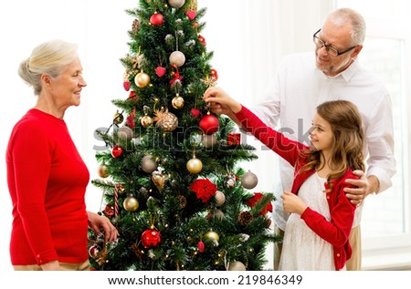 People Decorating For Christmas family decorating christmas tree stock images, royalty-free images People Decorating For Christmas family decorating christmas tree stock images, royalty-free images