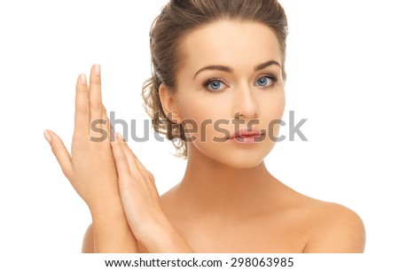 health and beauty concept - face and hands of beautiful woman with updo (can be used as a template for jewelry)