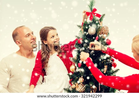 People Decorating A Christmas Tree family decorating christmas tree stock images, royalty-free images People Decorating A Christmas Tree family decorating christmas tree stock images, royalty-free images