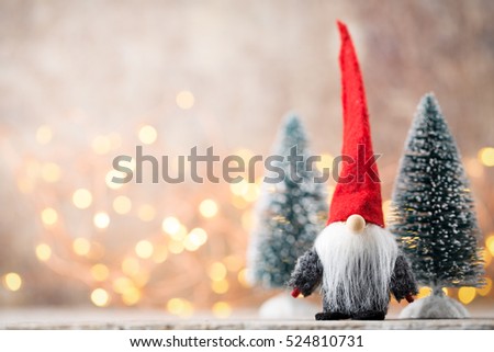 Christmas greeting card. Noel gnome background. Christmas symbol.