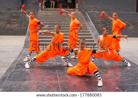 shaolin kung fu stick 21:The OCTOBER Shaolin kungfu Shaolin HENAN,CHINA performs group at of