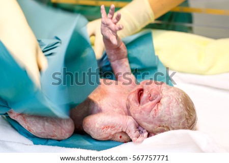 newborn child seconds minutes after birth stock photo edit now
