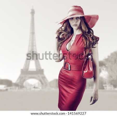 https://thumb7.shutterstock.com/display_pic_with_logo/666865/141569227/stock-photo-young-beautiful-woman-wearing-sexy-red-dress-hand-bag-belt-and-hat-walking-in-paris-france-141569227.jpg