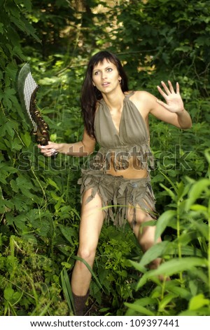 https://thumb7.shutterstock.com/display_pic_with_logo/674632/109397441/stock-photo-nice-girl-posing-with-a-loincloth-on-the-nature-109397441.jpg