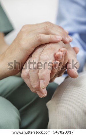 Female Nurse Holding Hand Senior Man Stock Photo 547820917 - 300x470 - jpeg Senior Holding Hands