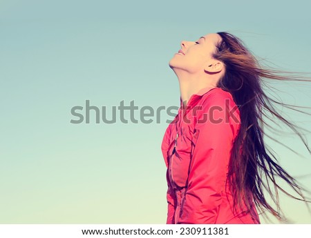 https://thumb7.shutterstock.com/display_pic_with_logo/696460/230911381/stock-photo-woman-smiling-looking-up-to-blue-sky-taking-deep-breath-celebrating-freedom-positive-human-emotion-230911381.jpg