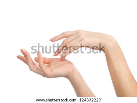 Beautiful woman hands with french manicure nails isolated on a white background