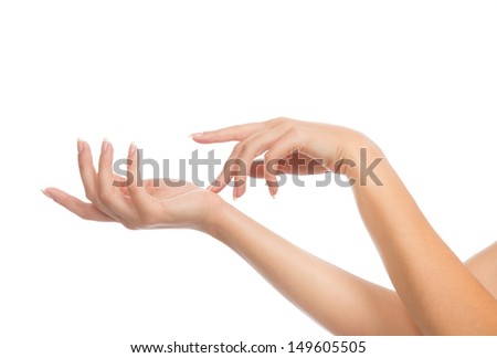 Beautiful woman hands with french manicure nails isolated on a white background