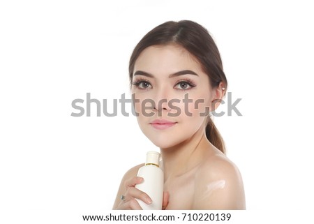 https://thumb7.shutterstock.com/display_pic_with_logo/707224/710220139/stock-photo-woman-face-beauty-girl-of-half-european-and-half-asian-beauty-and-cosmetics-image-hand-hold-710220139.jpg