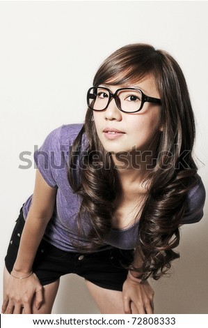 https://thumb7.shutterstock.com/display_pic_with_logo/70903/70903,1299689142,5/stock-photo-beautiful-asian-chinese-model-posing-with-glasses-72808333.jpg